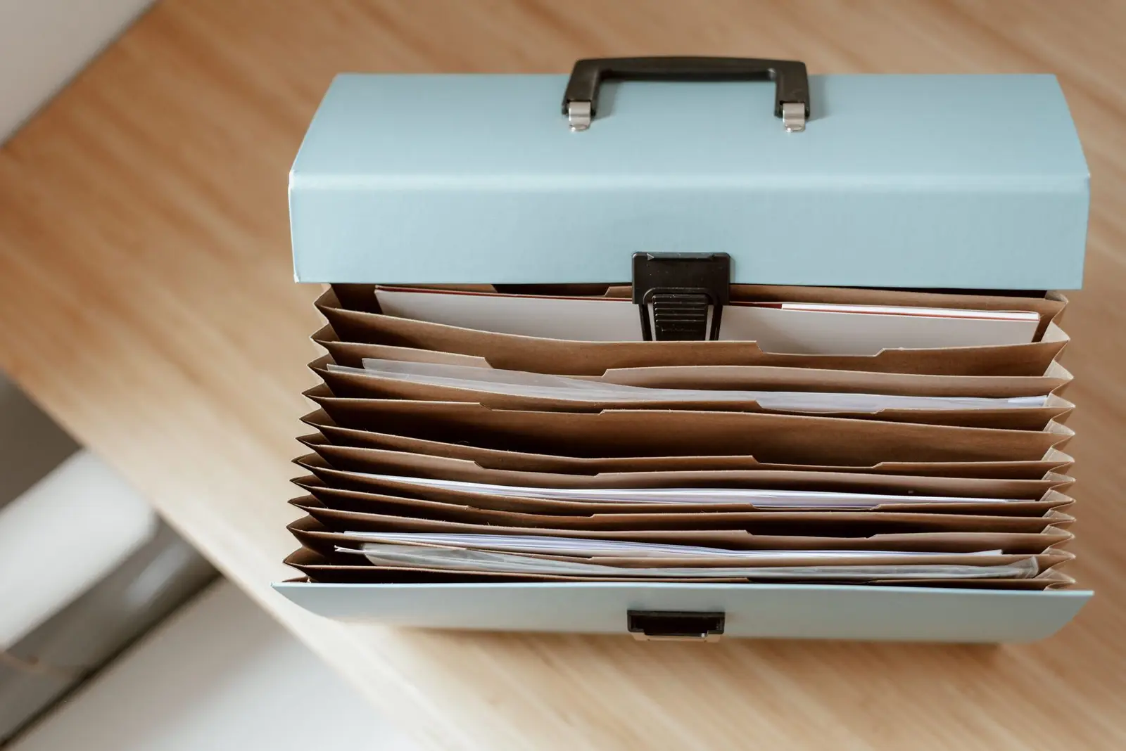 Document box full of paperwork